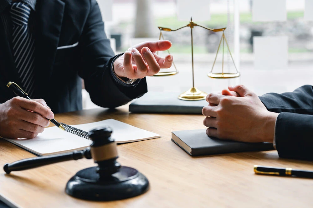 Attorney or Male judge consult or discuss contract papers with Businessman client in the office, law, and Legal services concept.